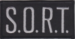S.O.R.T. Grey on Black Front Panel Patch 2" X 4"